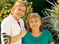 nurse and patient smiling