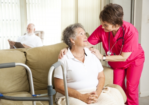 nurse and patient smiling