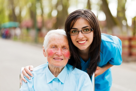 nurse and patient smiling