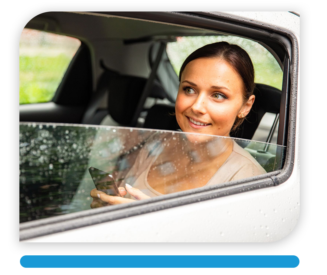 Woman smiling in car