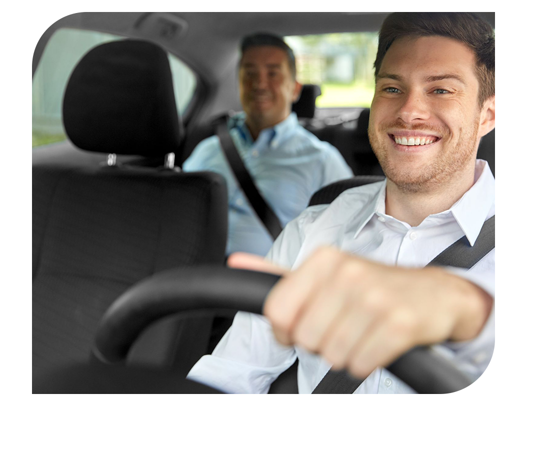 Driver smiling at passenger